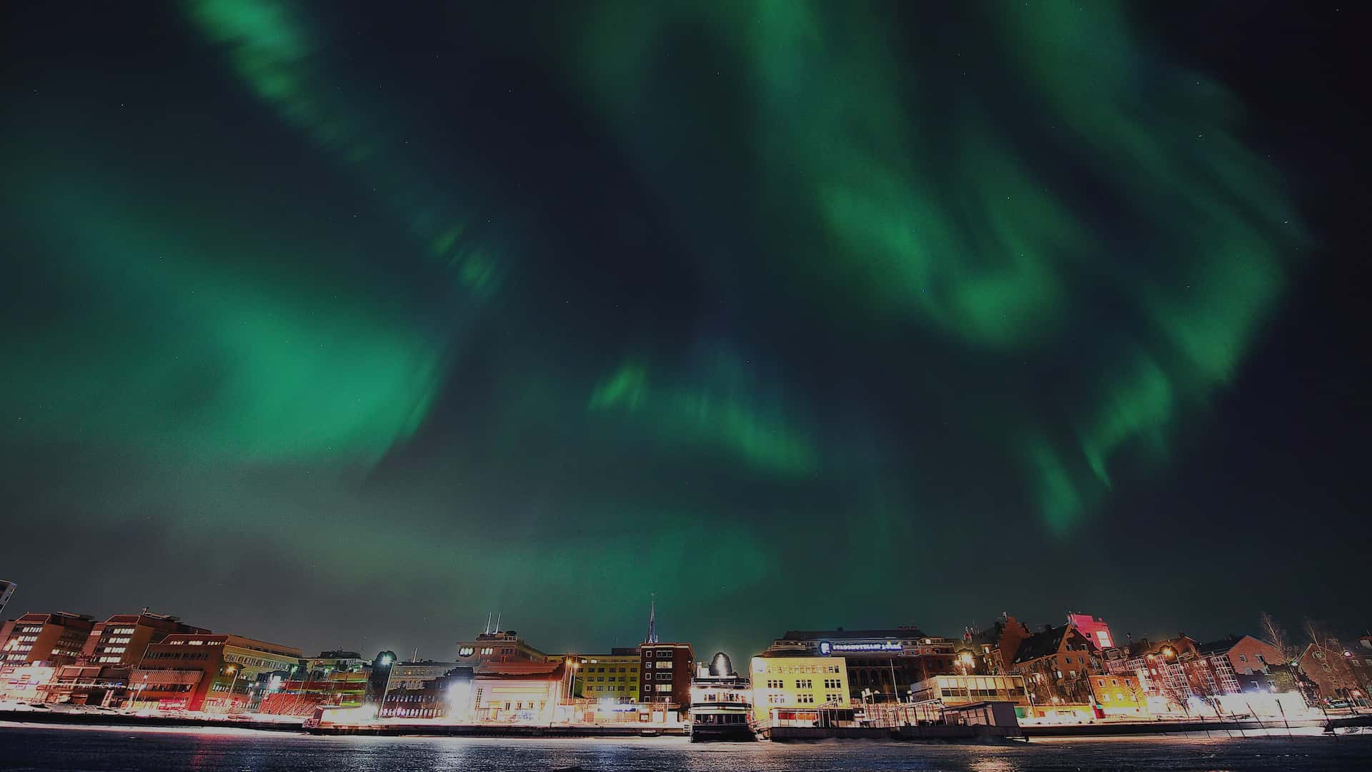Luleå northern docks with northern lights above